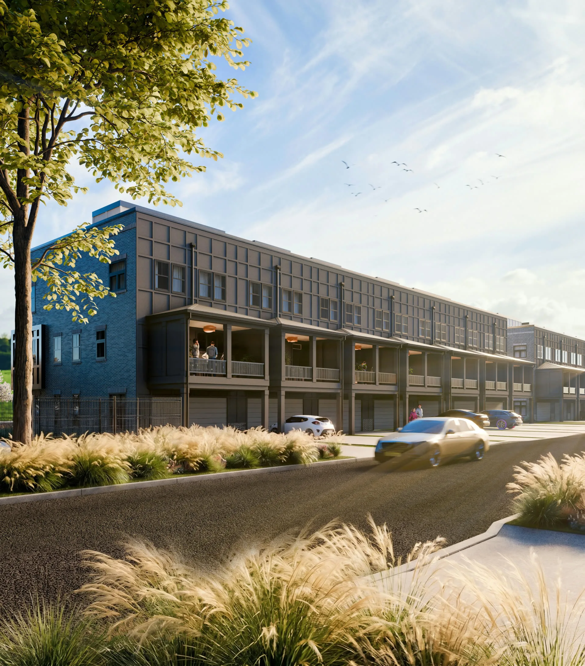 Rear elevation of the buildings with garages and driveways